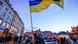 Krakow protesters wave the Ukrainian flag